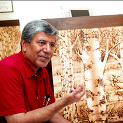 نقاشی با سوزاندن چوب - روایت علی‌اکبر نصرآبادی از نمایشگاه آثارش در موزه ارتباطات